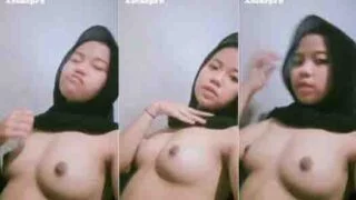 Bokep ukhti hijab hitam pamer susu mungil
